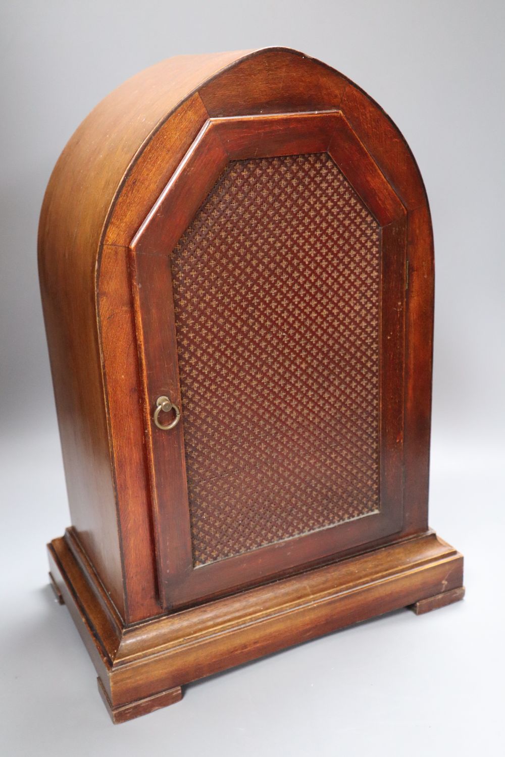 A Victorian mahogany and cut brass chiming lancet mantel clock, 6 inch silvered dial and French musical movement striking on five pipes
